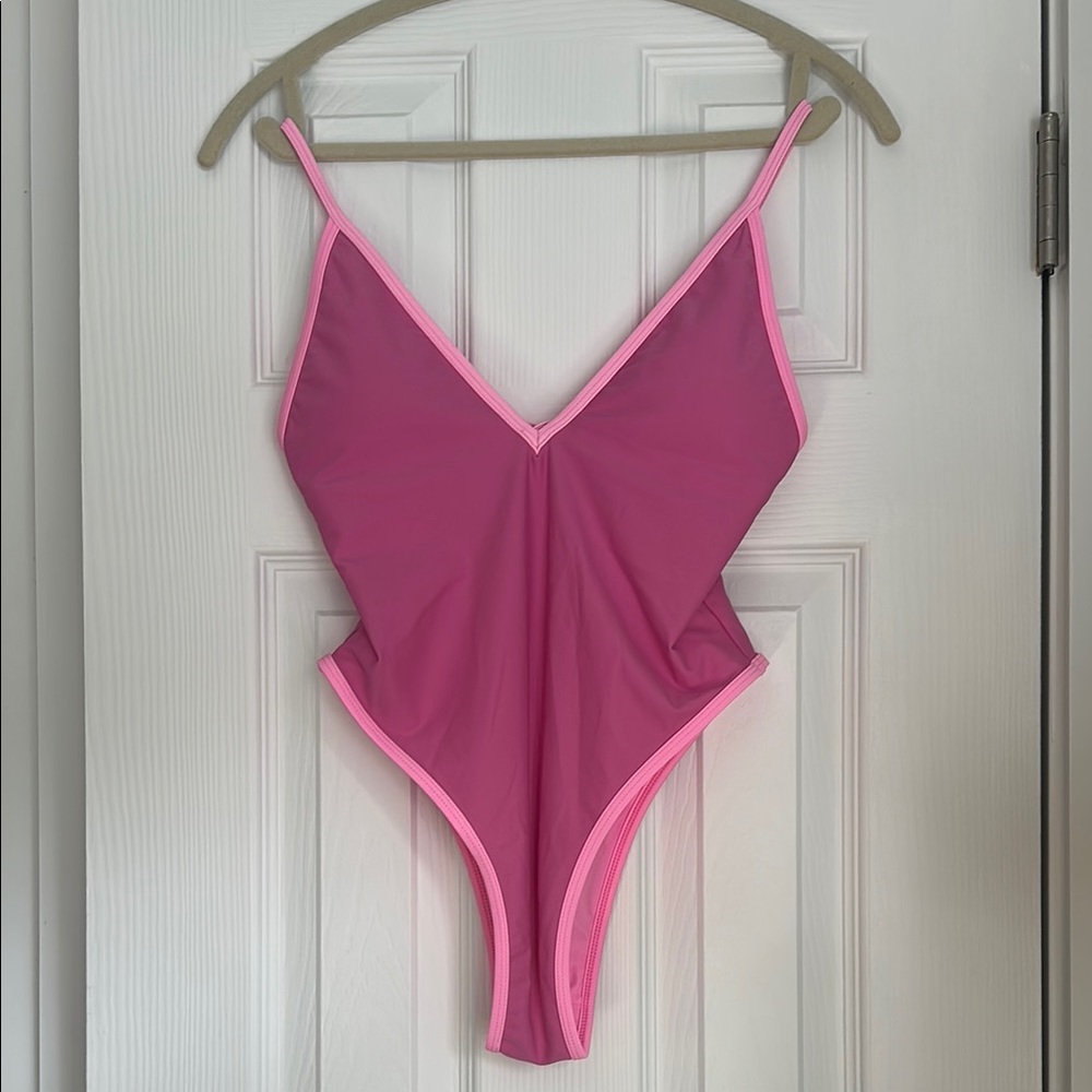 Pink One Piece Swimsuit with Plunging V-Neck and High-Cut Style